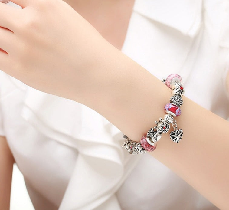 Crown, Love & Flower Multicharm Beads Bracelet with Safety Chain in hand
