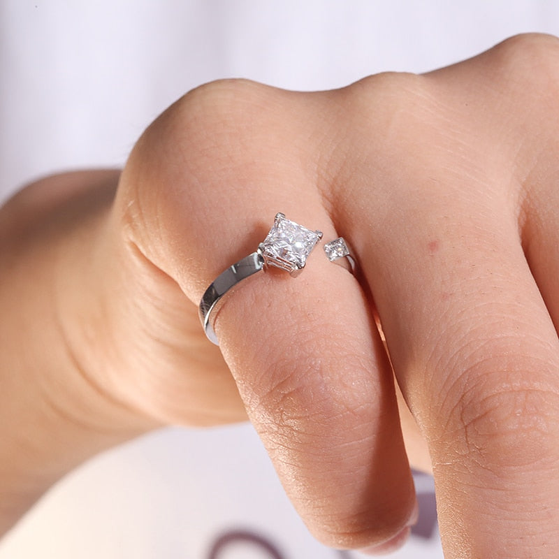 A stunning 1.042ct princess cut diamond ring with a square cut stone