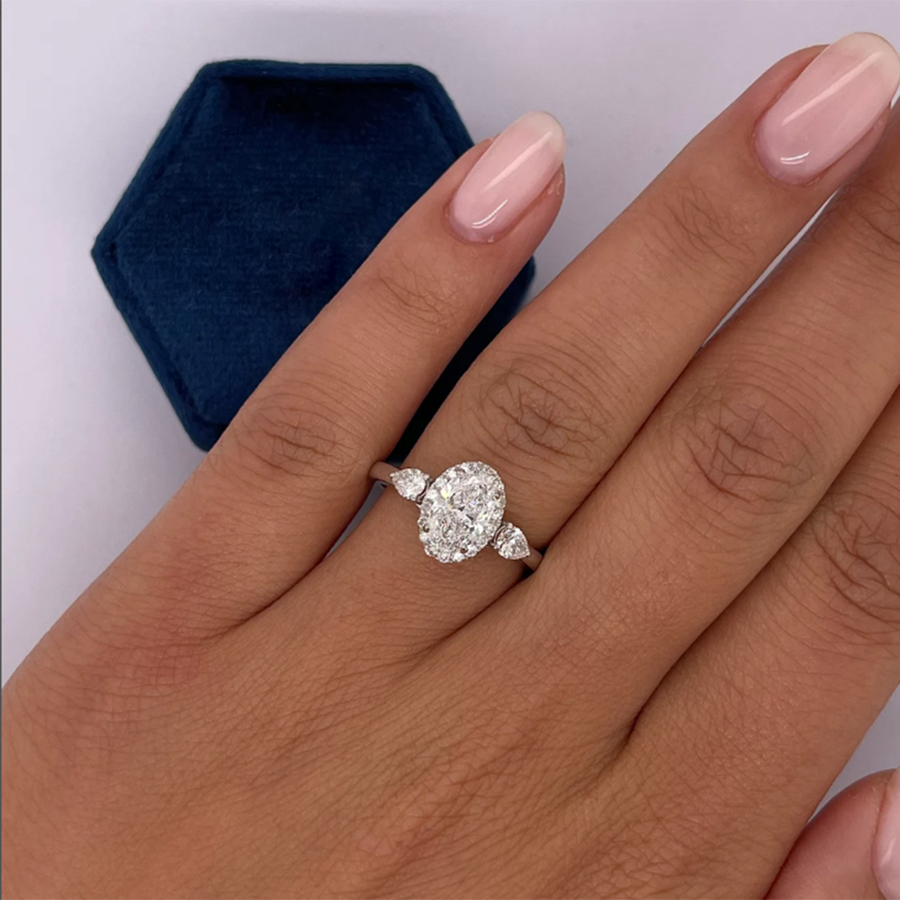 Tanisy Radiance 1.0ct emerald cut diamond ring with three side stones