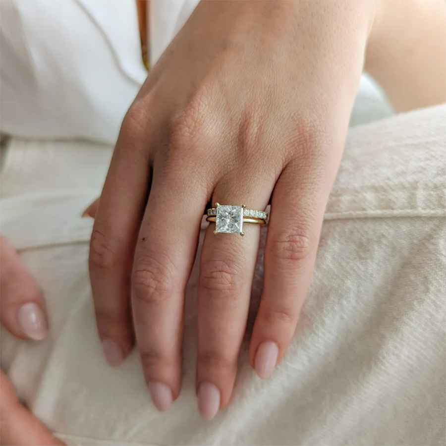 A woman's hand adorned with a Tanisy Rediance 1ct Princess Cut Lab Grown Diamond Ring