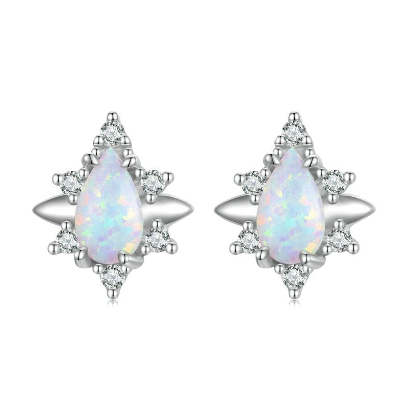 Opalite and diamond earrings featuring waterdrop-shaped opal studs.