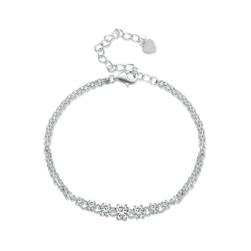 A Tanisy Sparkling Moissanite Adjustable Bracelet with diamond chain and heart charm.