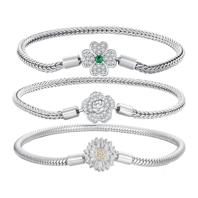 Three silver flower bracelets: variety clasp, handmade, snake chain.